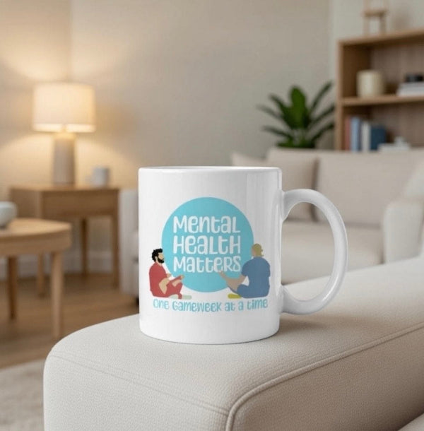 Mental Health Matters mug on a couch in a living room setting