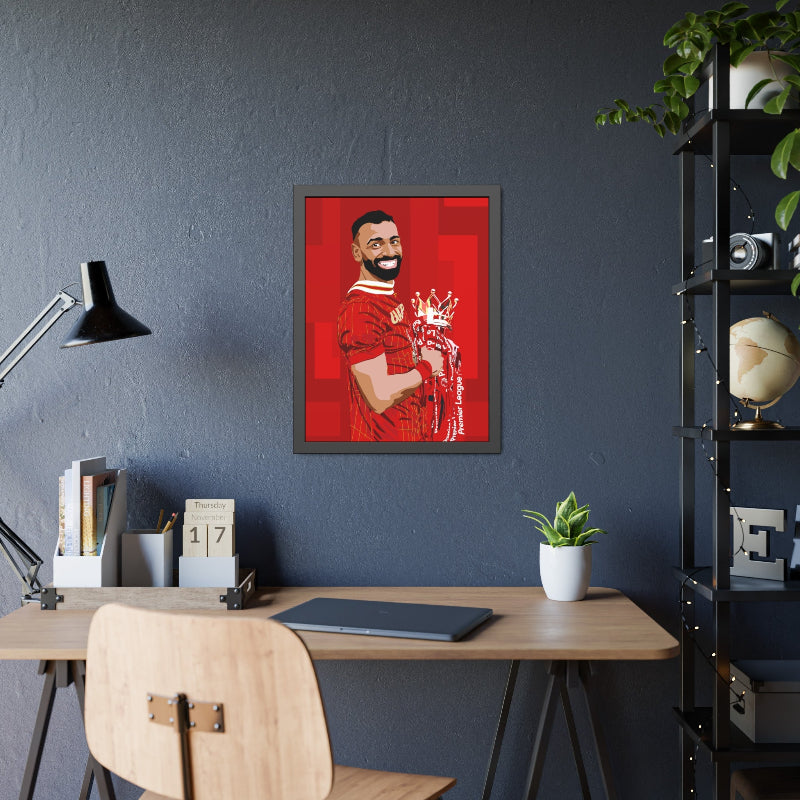 Framed artwork of a person in a red outfit on a blue wall above a desk.