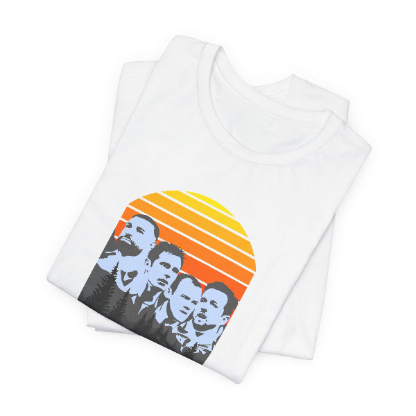 White tank top with a graphic design of four men and a sunset on a white background