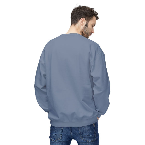 Man wearing a plain blue sweatshirt on a white background
