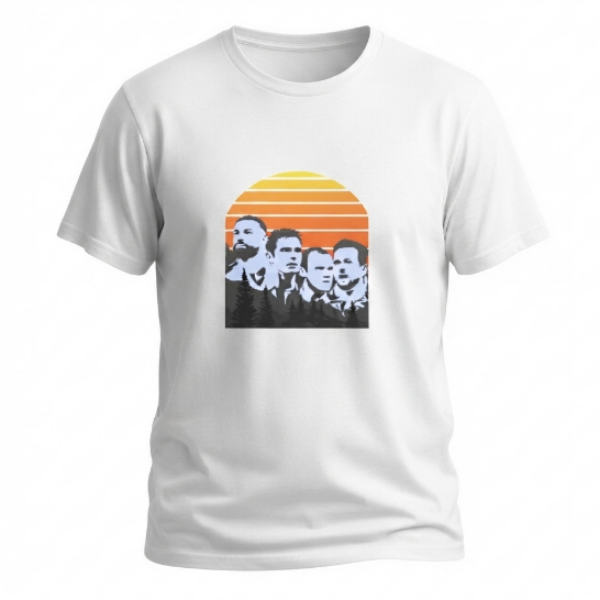 A white short-sleeve crewneck t-shirt featuring a retro-style graphic print of the band The Beatles in black and white portraits set against a yellow, orange, and red sunset.