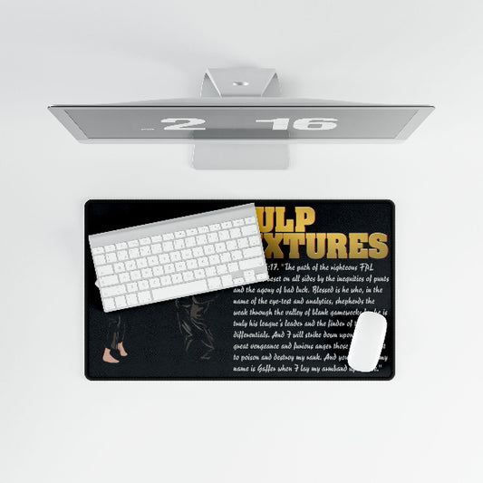 Desk setup with a computer monitor, keyboard, and mouse on a large mouse pad with text.