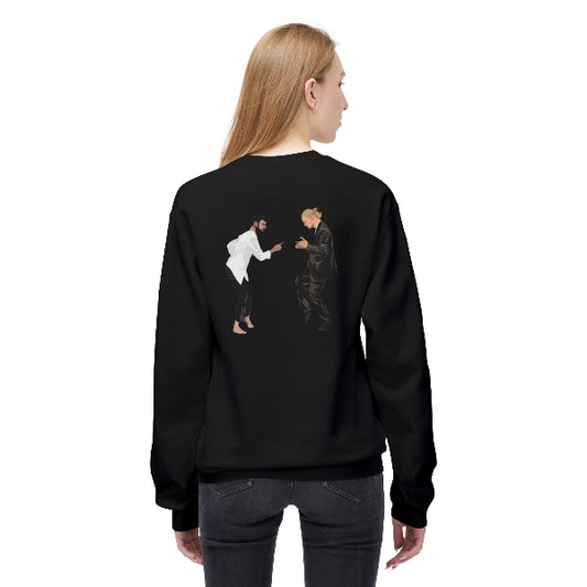 Person wearing a black sweatshirt with a graphic design on the back, standing against a white background
