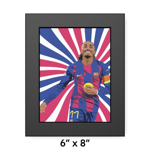 Framed artwork of a soccer player in a colorful uniform with a black frame.
