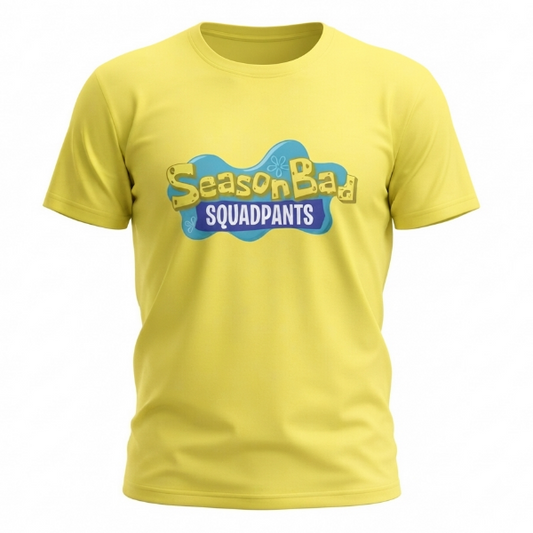 A yellow short-sleeve crewneck t-shirt featuring a 'Season Bad SQUADPANTS' graphic on the chest, displayed against a solid white background.