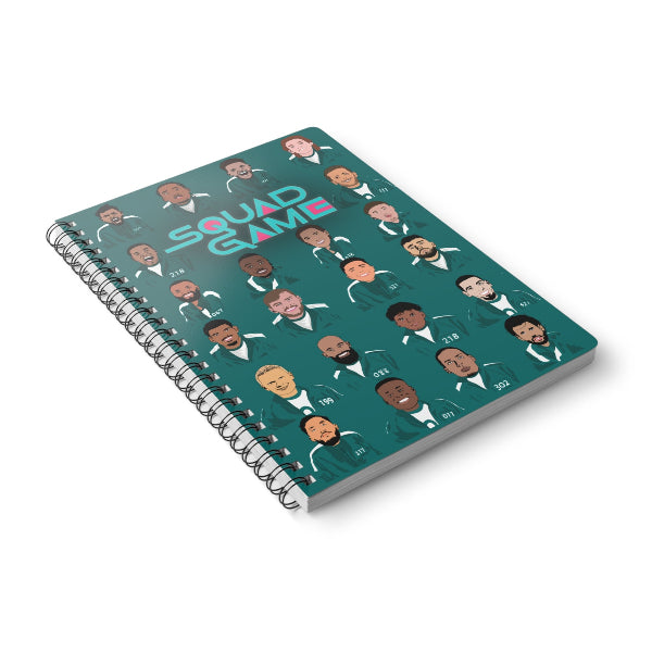 Notebook with illustrated faces and 'Squad Game' text on a teal background