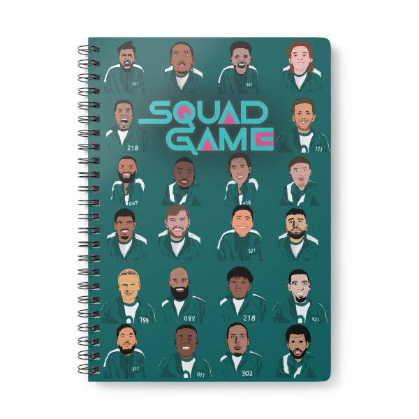Notebook with 'Squad Game' design featuring illustrated faces on a green background