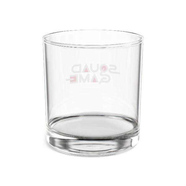 Clear glass tumbler with branding on a white background