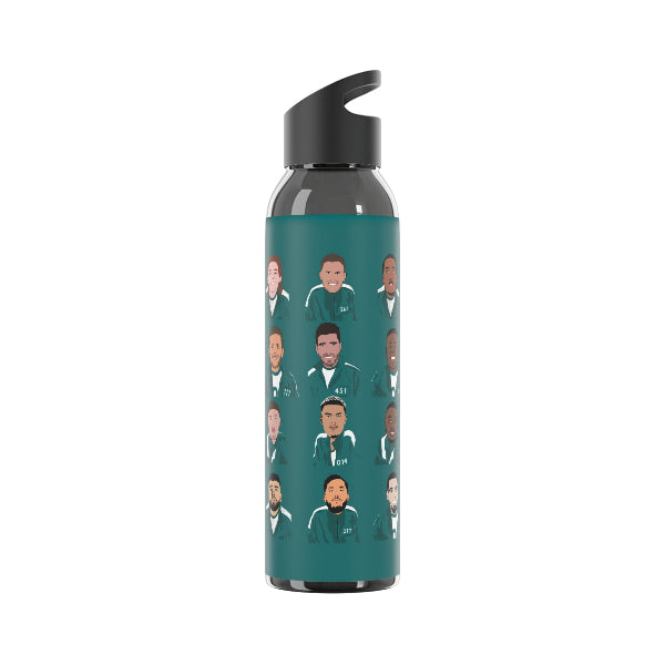 Water bottle with repeated face pattern on a teal background