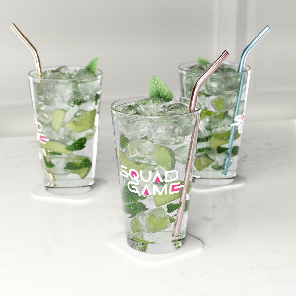 Three glasses of mojito with straws on a white background