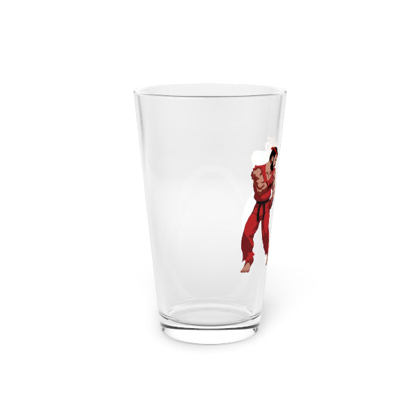 Clear glass tumbler with a printed design of a person in a red outfit on a white background
