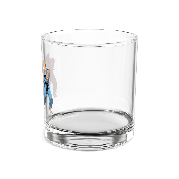 Clear glass tumbler with colorful design on a white background