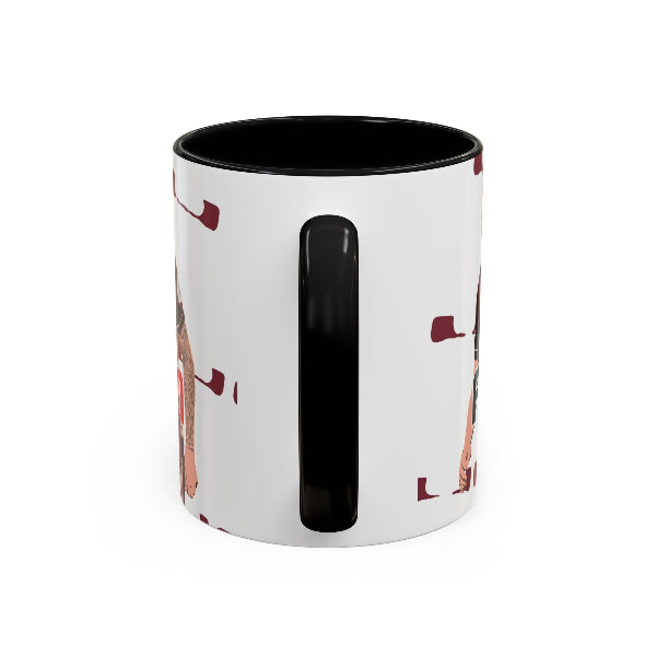 A white ceramic mug with a black handle and black interior, featuring a partial abstract art print in reddish-brown and black on the side, shown against a plain white background.