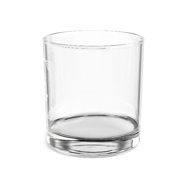 Clear glass tumbler with a heart design on a white background