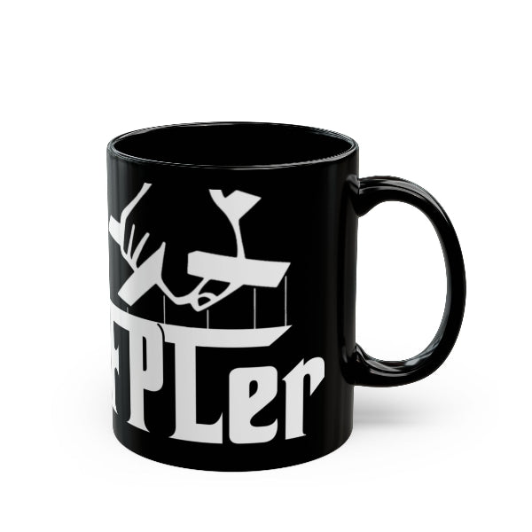 Black mug with white graphic design and text on a white background