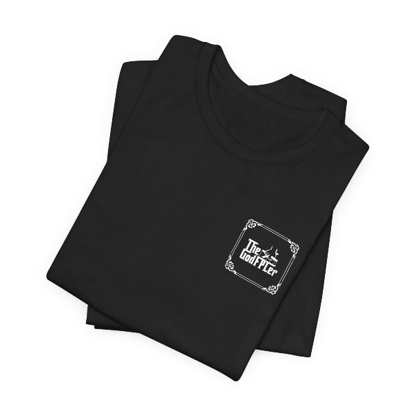 Folded maroon t-shirt with 'No Fixed Route' text on a white background