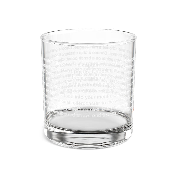 Clear glass tumbler with textured surface on a white background