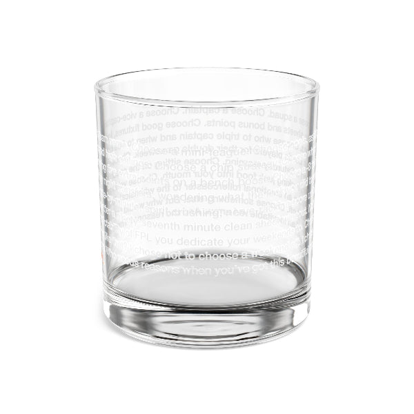 Clear glass tumbler with a heart design on a white background