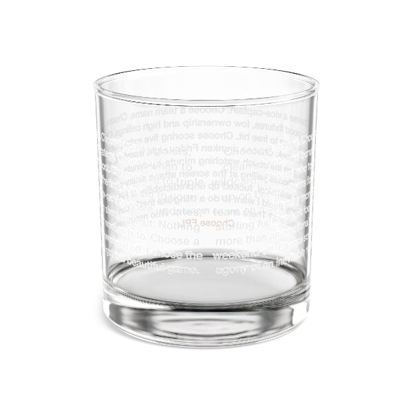 Clear glass tumbler with branding on a white background