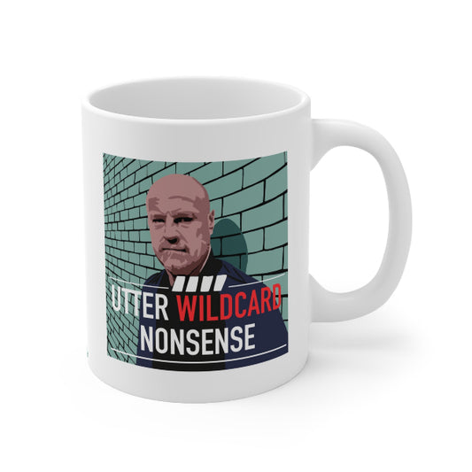 White mug with a graphic design featuring a person against a brick wall and text on a white background