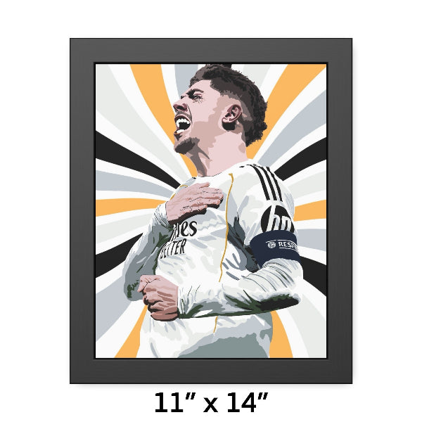 Framed artwork of a soccer player in a white jersey with visible branding, size 11" x 14".
