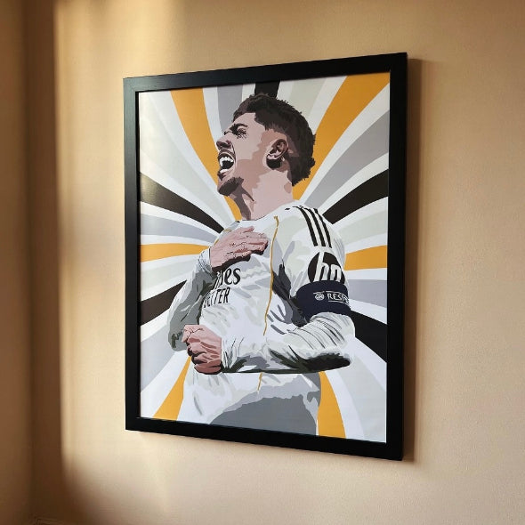Framed artwork of a soccer player on a beige wall